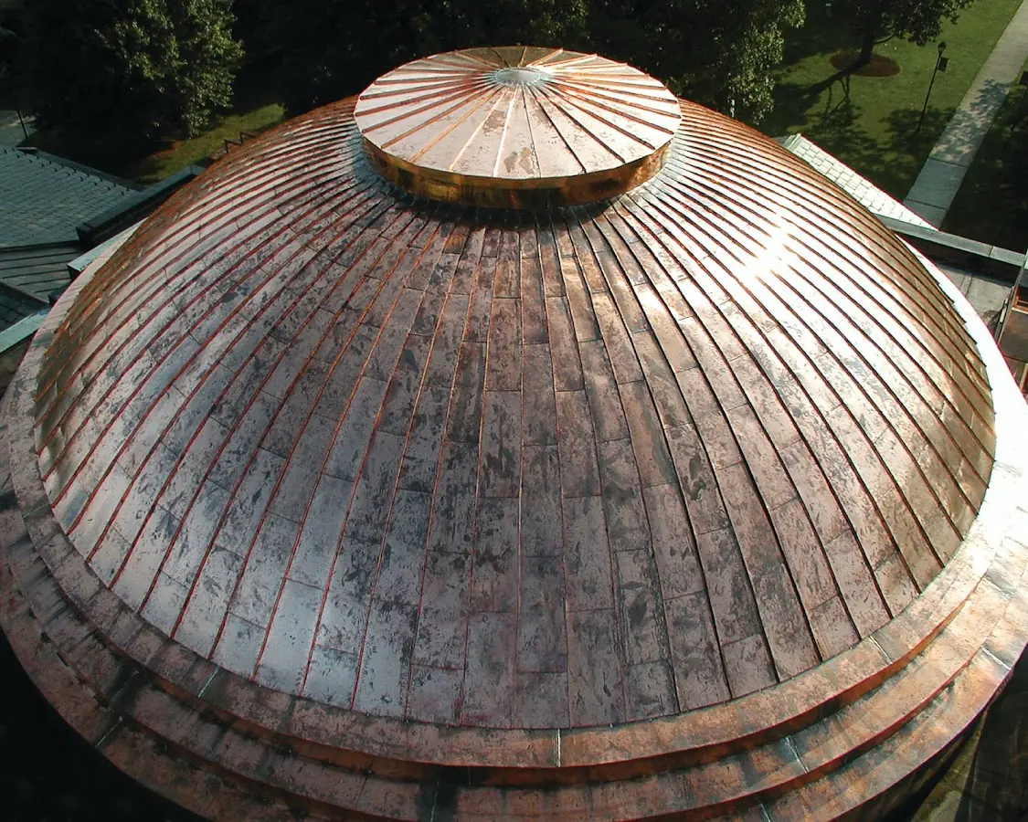 Craftsman Roofing crew installing a new roof in Defiance